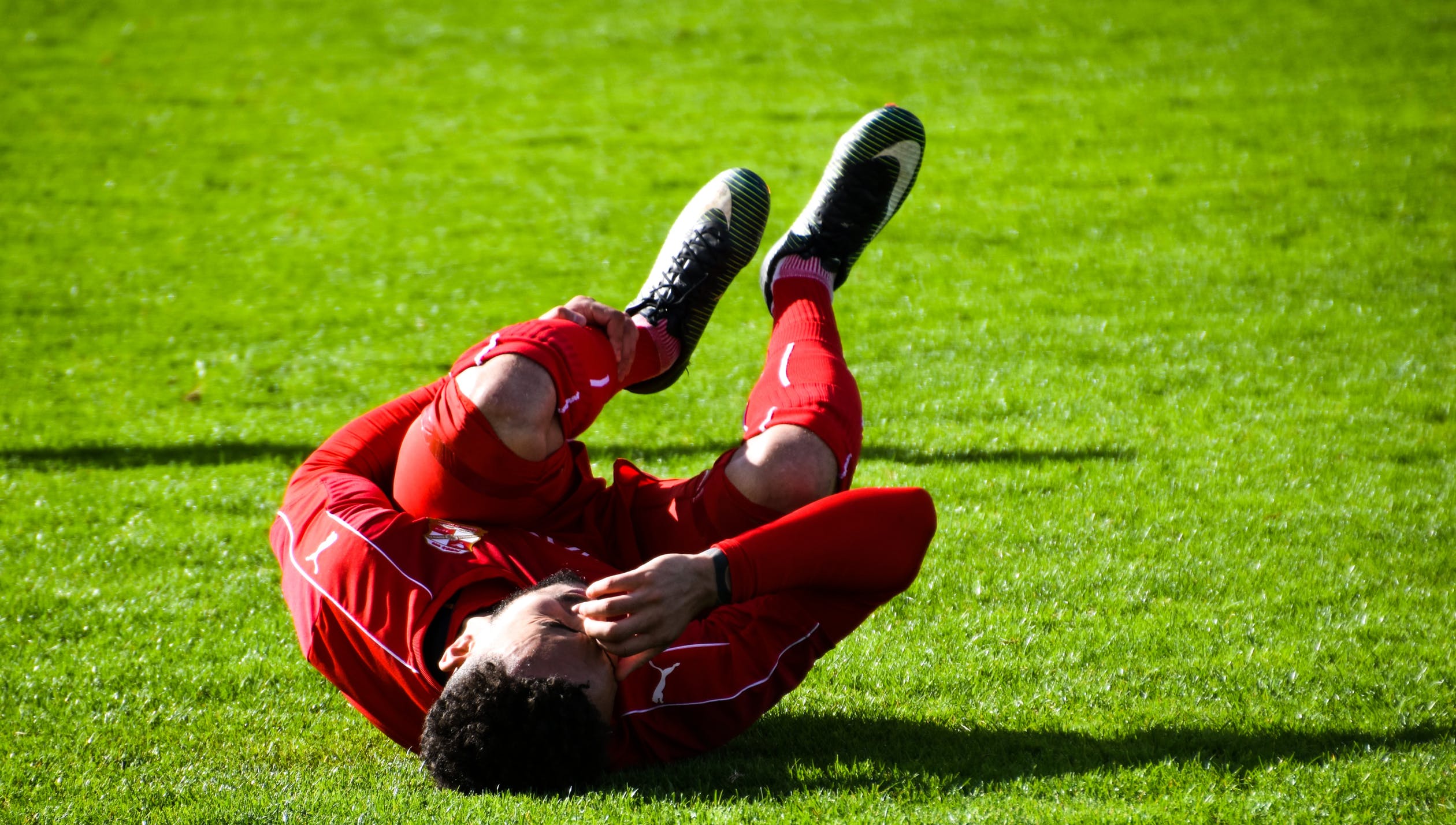 soccer player faking injury on field